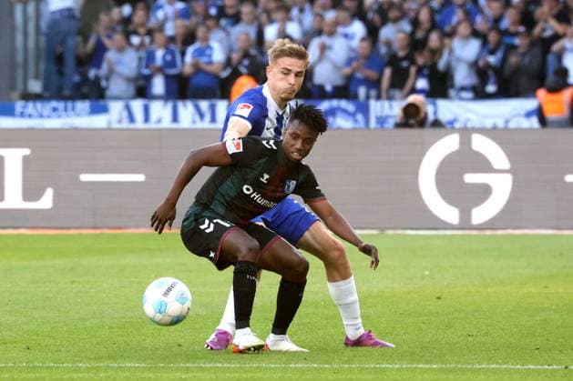 DEU, DFL, 2 FBL, Hertha BSC vs 1 FC Magdeburg, 25 04 2025, Berliner Olympiastadion, Berlin, DEU, DFL, 2 FBL, Hertha BSC vs 1 FC Magdeburg, im Bild Marten Winkler Hertha BSC Berlin 22 , Lubambo Musonda 1 FC Magdeburg 19 DFL regulations prohibit any use of Photographs as image sequences and or quasi video nordphotoxGmbHx xEngler nph00076