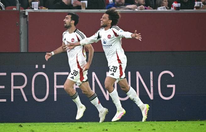 Soccer, 2 Bundesliga, Germany, Men, Season 2024 2025, 31 Matchday, Merkur Spiel Arena Düsseldorf, Fortuna Düsseldorf FC Nuremberg cheer Mahir Emreli FCN after his goal to 0 2, together with Janis Antiste FCN cheer, joy, action