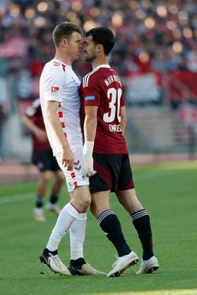 Dispute, exchange of words between Dominique Heintz 1 FC Koeln, 3 l and Mahir Emreli 1 FC Nuernberg, 30 , 09 05 2025, Soccer, 2 Bundesliga, 1 FC Nürnberg 1 FC Köln, GER, Nuernberg, Max Morlock Stadion, DFL REGULATIONS PROHIBIT ANY USE OF PHOTOGRAPHS AS IMAGE SEQUENCES AND OR QUASI VIDEO Copyright: HMBxMedia xHeikoxBecker