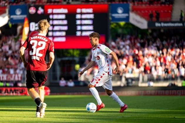 Luca Waldschmidt FC Koeln, 09 on the ball, in front Tim Janisch FC Nuernberg, 32 , GER, 1 FC Nuernberg FCN vs 1 FC Koeln KOE , Soccer 2 Bundesliga, Matchday 33, Season 2024 2025, 09 05 2025 DFB DFL regulations prohibit any use of photographs as image sequences and or quasi video GER, 1 FC Nuernberg FCN vs 1 FC Koeln KOE , Soccer 2 Bundesliga, Matchday 33, Season 2024 2025, 09 05 2025 Nuernberg Copyright: xEibner-Pressefoto Memmlerx EP_MMR