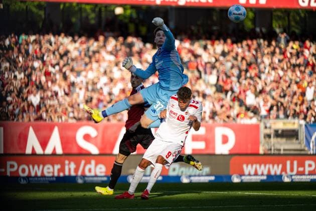 Michal Kukucka FC Nuernberg, 37 in duel with Luca Waldschmidt FC Koeln, 09 , GER, 1 FC Nuernberg FCN vs 1 FC Koeln KOE , Soccer 2 Bundesliga, Matchday 33, Season 2024 2025, 09 05 2025 DFB DFL regulations prohibit any use of photographs as image sequences and or quasi video GER, 1 FC Nuernberg FCN vs 1 FC Koeln KOE , Soccer 2 Bundesliga, Matchday 33, Season 2024 2025, 09 05 2025 Nuernberg Copyright: xEibner-Pressefoto Memmlerx EP_MMR