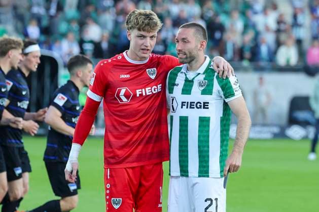 Goalkeeper Johannes Schenk SC Preussen Muenster and Rico Preissinger SC Preussen Muenster cheer, 2 Bundesliga, Preußen Münster vs Hertha BSC, Preußenstadion on May 09, 2025 in Münster, Germany Photo by Marco Steinbrenner DeFodi Images Goalkeeper Johannes Schenk SC Preussen Muenster and Rico Preissinger SC Preussen Muenster cheer, 2 Bundesliga, Preußen Münster vs Hertha BSC, Preußenstadion, May 9, 2025 in Münster, Germany Photo by Marco Steinbrenner DeFodi Images DFB DFL REGULATIONS PROHIBIT ANY USE OF PHOTOGRAPHS AS IMAGE SEQUENCES AND OR QUASI VIDEO