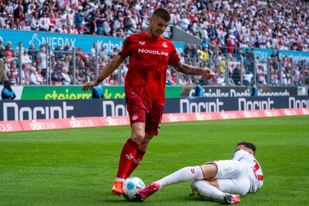 Erik Wekesser 1 FC Kaiserslautern, 13 in duel against Leart Pacarada 1 FC Koeln, 17 1 FC Koeln vs 1 FC Kaiserslautern, Football, 2 Bundesliga, Matchday 34, Season 2024 2025, 18 05 2025 DFL REGULATES PROHIBIT ANY USE OF PHOTOGRAPHS AS IMAGE SEQUENCES AND OR QUASI VIDEO 1 FC Koeln vs 1 FC Kaiserslautern, Football, Bundesliga 2, Matchday 34, Season 2024 2025, 18 05 2025 Koeln Copyright: xEibner-Pressefoto JustinxDerondex EP_JDU