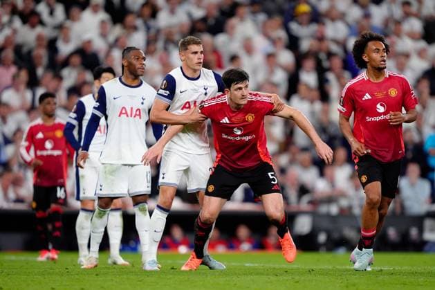 Micky Van de Ven of Tottenham Hotspur and Harry Maguire of Manchester United, ManU Tottenham Hotspur v Manchester United, Europa League Final, Football, San Mames Stadium, Bilbao, Spain - 21 May 2025 EDITORIAL USE ONLY No use with unauthorised audio, video, data, fixture lists, club league logos or live services. Online in-match use limited to 120 images, no video emulation. No use in betting, games or single club league player publications. Copyright: xGokhanxTaner Shutterstockx 15312892fq
