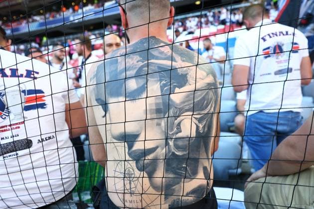 A tattoo on the back of a fan Paris Saint-Germain v Inter Milan, UEFA Champions League Final, Football, Allianz Arena, Munich, Germany - 31 May 2025 EDITORIAL USE ONLY No use with unauthorised audio, video, data, fixture lists, club league logos or live services. Online in-match use limited to 120 images, no video emulation. No use in betting, games or single club league player publications. Copyright: xMichaelxZemanek Shutterstockx 15330931a