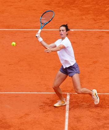 Lois Boisson practices on an empty Philippe Chatrier Court ahead of her semi final later in the day French Open Tennis, Day Twelve, Tennis, Roland Garros, Paris, France - 05 Jun 2025 EDITORIAL USE ONLY No use with unauthorised audio, video, data, fixture lists, club league logos or live services. Online in-match use limited to 120 images, no video emulation. No use in betting, games or single club league player publications. Copyright: xJavierxGarcia Shutterstockx 15337995n