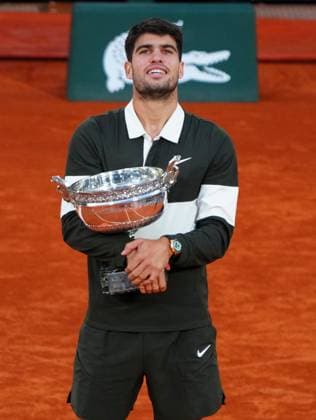 Carlos Alcaraz with the trophy French Open Tennis, Day Fifteen, Tennis, Roland Garros, Paris, France - 08 Jun 2025 EDITORIAL USE ONLY No use with unauthorised audio, video, data, fixture lists, club league logos or live services. Online in-match use limited to 120 images, no video emulation. No use in betting, games or single club league player publications. Copyright: xJavierxGarcia Shutterstockx 15346224az