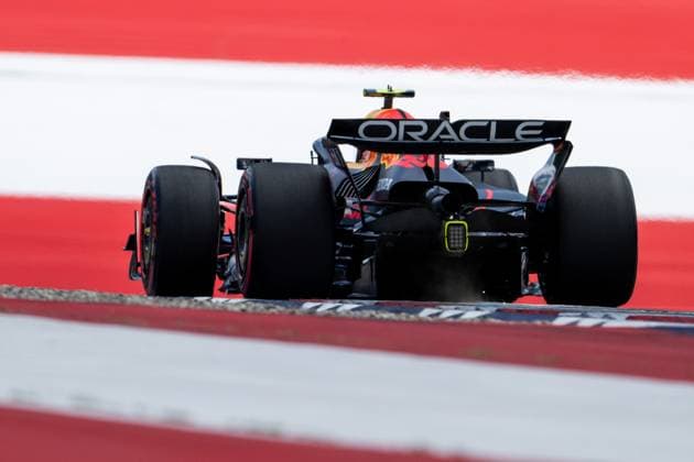 Yuki Tsunoda Oracle Red Bull Racing, Japan, 22 in RB21 from behind in front of painted flag flag on the asphalt in the finish curve curve 10, AUT, Formula 1 World Championship, MSC Cruises Grand Prix of Austria, Red Bull Ring Spielberg, Qualifying Day, 2025 season, 28 06 2025 AUT, Formula 1 World Championship, MSC Cruises Grand Prix of Austria, Red Bull Ring Spielberg, Qualifying Day, 2025 season, 28 06 2025 Spielberg Copyright: xEibner-Pressefoto Memmlerx EP_MMR
