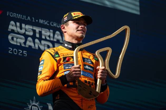 Lando Norris McLaren Formula 1 Team, Great Britain, 04 cheers on the podium at the podium ceremony with trophy for the victory, AUT, Formula 1 World Championship, MSC Cruises Grand Prix of Austria, Red Bull Ring Spielberg, Race, Season 2025, 29 06 2025 AUT, Formula 1 World Championship, MSC Cruises Grand Prix of Austria, Red Bull Ring Spielberg, Race, Season 2025, 29 06 2025 Spielberg Copyright: xEibner-Pressefoto Memmlerx EP_MMR