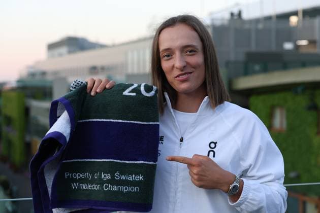 July 12, 2025, London, England: IGA SWIATEK, 24 of Poland celebrates the winning of final Tennis superstar Swiatek becomes champion of the 2025 All England Club, after thrashing 6-0, 6-0 American Anisimova, 23. Historic day, as her first Wimbledon win, and first women™s final at the tournament in 114 years in which one player failed to claim a single game. It seems, said Swiatek, who is now unbeaten and 6-0 in major title matches, super surreal. after routing the 13th-seeded, USA s Anisimova, in her first Slam final on a sunny, breezy Saturday on Centre Court. I was a bit frozen there, with my nerves. Maybe the last two weeks I got a bit tired or something, said Anisimova, who skipped practice on Friday because of fatigue and felt pain in her right shoulder while warming up before the match. London United Kingdom - ZUMAc278 20250713_zsp_c278_005 Copyright: xMarcinxCholewinskix