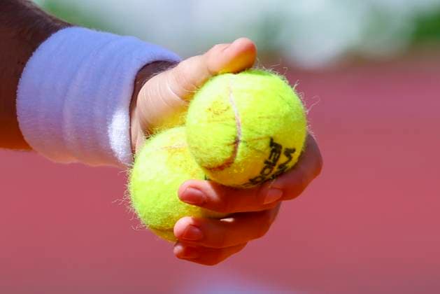 A tennis player holds two tennis balls in his left hand before serving, ATP 250 Tournament, Generali Open Kitzbuhel, Tennis stadium at Kapserfeld, July 22, 2025 in Kitzbuehel, Austria Photo by Marco Steinbrenner DeFodi Images A tennis player holds two tennis balls in his left hand before serving, ATP 250 Tournament, Generali Open Kitzbuhel, Tennis stadium at Kapserfeld, July 22, 2025 in Kitzbuehel, Austria Photo by Marco Steinbrenner DeFodi Images