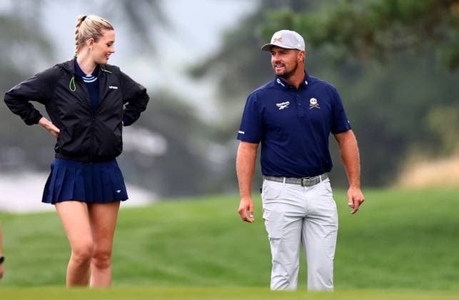 Bryson DeChambeau of USA and Presenter Annabel Angel during their round. LIV Golf UK, Pro-AM, Golf, JCB Golf & Country Club, Uttoxeter, UK - 24 Jul 2025Uttoxeter JCB Golf & Country Club United Kingdom EDITORIAL USE ONLY No use with unauthorised audio, video, data, fixture lists, club league logos or live services. Online in-match use limited to 120 images, no video emulation. No use in betting, games or single club league player publications. Copyright: xJamesxMarsh Shutterstockx 15410870c