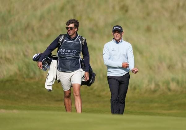Grant Forrest (SCO) walks up the 18th fairway with his caddie Shane O Connell. Nexo Championship, Day Four, Golf, Trump International Golf Links, Aberdeenshire, Scotland, UK - 10 Aug 2025Aberdeenshire Trump International Golf Links Scotland United Kingdom EDITORIAL USE ONLY No use with unauthorised audio, video, data, fixture lists, club league logos or live services. Online in-match use limited to 120 images, no video emulation. No use in betting, games or single club league player publications. Copyright: xStuartxWallace Shutterstockx 15429702m