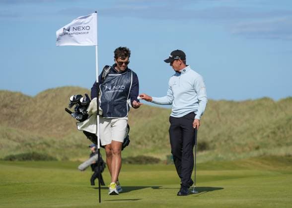 Grant Forrest (SCO) on the 18th green with his caddie Shane O Connell. Nexo Championship, Day Four, Golf, Trump International Golf Links, Aberdeenshire, Scotland, UK - 10 Aug 2025Aberdeenshire Trump International Golf Links Scotland United Kingdom EDITORIAL USE ONLY No use with unauthorised audio, video, data, fixture lists, club league logos or live services. Online in-match use limited to 120 images, no video emulation. No use in betting, games or single club league player publications. Copyright: xStuartxWallace Shutterstockx 15429702n