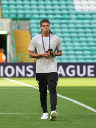 Jahmai Simpson-Pusey of Celtic on the pitch shortly after arriving at Celtic Park. Celtic v Kairat Almaty, UEFA Champions League, Play-Off Round, First Leg, Football, Celtic Park, Glasgow, Scotland, UK - 20 Aug 2025Glasgow Celtic Park Scotland United Kingdom EDITORIAL USE ONLY No use with unauthorised audio, video, data, fixture lists, club league logos or live services. Online in-match use limited to 120 images, no video emulation. No use in betting, games or single club league player publications. Copyright: xStuartxWallace Shutterstockx 15446684b
