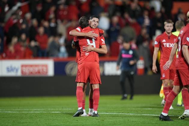 Aberdeen players hug after full time Aberdeen v FCSB, UEFA Europa League, Play-Off Round, First Leg, Football, Pittodrie, Aberdeen, Scotland, UK - 21 Aug 2025Aberdeen Pittodrie Scotland United Kingdom EDITORIAL USE ONLY No use with unauthorised audio, video, data, fixture lists, club league logos or live services. Online in-match use limited to 120 images, no video emulation. No use in betting, games or single club league player publications. Copyright: xPetexSummers Shutterstockx 15449391gb