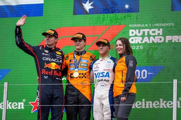 Max Verstappen Oracle Red Bull Racing, Netherlands, 01 , Oscar Piastri McLaren Formula 1 Team, Australia, 81 , Isack Hadjar Visa Cash App Racing Bulls F1 Team, France, 06 , Laura Bowden McLaren, CFO on the podium at the podium ceremony, NED, Formula 1 World Championship, Heineken Grand Prix of the Netherlands, Circuit Zandvoort, Race, 2025 season, 31 08 2025 NED, Formula 1 World Championship, Heineken Grand Prix of the Netherlands, Circuit Zandvoort, Race, 2025 season, 31 08 2025 Zandvoort Copyright: xEibner-Pressefoto Memmlerx EP_MMR