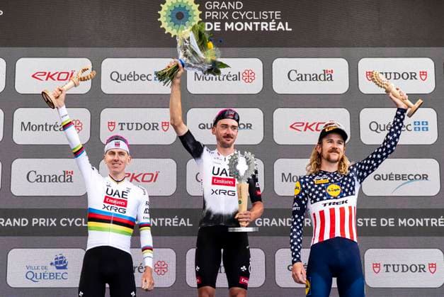 September 14, 2025, Montreal, Qc, Canada: First place winner Brandon McNulty from the USA, centre, second place winner Tadej Pogacar, of Slovenia, left, and third place winner Quinn Simmons, of the USA, celebrate on the podium following UCI Montreal Grand Prix Cycling race action in Montreal on Sunday, Sept. 14, 2025. Montreal Canada - ZUMAc35_ 20250914_zaf_c35_101 Copyright: xChristopherxKatsarovx Canada News - September 14, 2025 - ZUMA0833 0833703495st Copyright: xIMAGO ChristopherxKatsarovx