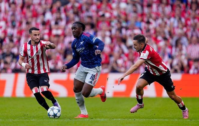 Eberechi Eze of Arsenal in action against after Alex Berenguer (left) and Andoni Gorosabel of Athletic Bilbao Athletic Bilbao v Arsenal, UEFA Champions League, Group Stage, Football, Estadio de San Mames, Bilbao, Spain - 16 Sep 2025Bilbao Estadio de San Mames Spain EDITORIAL USE ONLY No use with unauthorised audio, video, data, fixture lists, club league logos or live services. Online in-match use limited to 120 images, no video emulation. No use in betting, games or single club league player publications. Copyright: xSergioxRuiz Shutterstockx 15481341ao