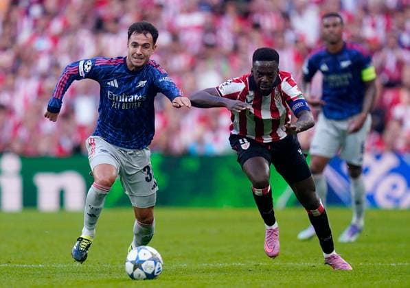 Cristhian Mosquera of Arsenal in action against Oihan Sancet of Athletic Bilbao Athletic Bilbao v Arsenal, UEFA Champions League, Group Stage, Football, Estadio de San Mames, Bilbao, Spain - 16 Sep 2025Bilbao Estadio de San Mames Spain EDITORIAL USE ONLY No use with unauthorised audio, video, data, fixture lists, club league logos or live services. Online in-match use limited to 120 images, no video emulation. No use in betting, games or single club league player publications. Copyright: xSergioxRuiz Shutterstockx 15481341at