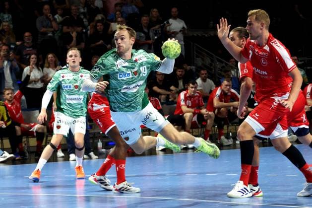 DEU, DHB, 1 HBL, Fuechse Berlin vs Melsungen, 21 09 2025, Max Schmeling Halle, Berlin, DEU, DHB, 1 HBL, Fuechse Berlin vs Melsungen, in the picture Mathias Gidsel Fuechse Berlin 19 , David Mandic MT Melsungen 7 nordphotoxGmbHx xEngler nph00076