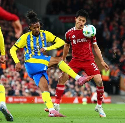 Wataru Endo of Liverpool takes one in the face from Damion Downs of Southampton Liverpool v Southampton, EFL Carabao Cup, Third Round, Football, Anfield, Liverpool, UK - 23 Sep 2025Liverpool Anfield United Kingdom EDITORIAL USE ONLY No use with unauthorised audio, video, data, fixture lists, club league logos or live services. Online in-match use limited to 120 images, no video emulation. No use in betting, games or single club league player publications. Copyright: xPaulxCurrie Shutterstockx 15498466cl