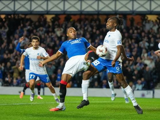 Derek Cornelius of Rangers challenges for the ball with Joris Kayembe of Genk Rangers v Genk, UEFA Europa League, Football, Ibrox Stadium, Glasgow, Scotland, UK - 25 Sep 2025Glasgow Ibrox Stadium Scotland United Kingdom EDITORIAL USE ONLY No use with unauthorised audio, video, data, fixture lists, club league logos or live services. Online in-match use limited to 120 images, no video emulation. No use in betting, games or single club league player publications. Copyright: xStuartxWallace Shutterstockx 15498613t