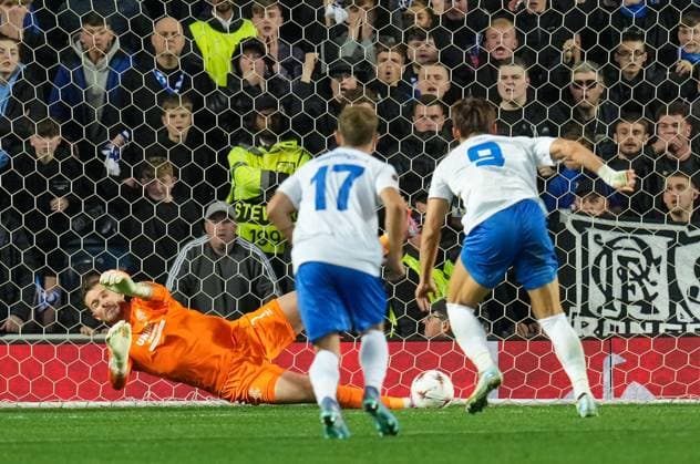 Rangers goalkeeper Jack Butland saves a penalty kick from Hyeongyu Oh of Genk Rangers v Genk, UEFA Europa League, Football, Ibrox Stadium, Glasgow, Scotland, UK - 25 Sep 2025Glasgow Ibrox Stadium Scotland United Kingdom EDITORIAL USE ONLY No use with unauthorised audio, video, data, fixture lists, club league logos or live services. Online in-match use limited to 120 images, no video emulation. No use in betting, games or single club league player publications. Copyright: xStuartxWallace Shutterstockx 15498613at