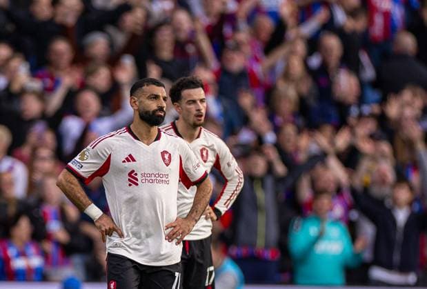 (250928) -- LONDON, Sept. 28, 2025 -- Liverpool s Mohamed Salah (L) reacts after Crystal Palace scored an injury-time winning goal during the English Premier League match between Crystal Palace FC and Liverpool FC in London, Britain, on Sept. 27, 2025. FOR EDITORIAL USE ONLY. NOT FOR SALE FOR MARKETING OR ADVERTISING CAMPAIGNS. NO USE WITH UNAUTHORIZED AUDIO, VIDEO, DATA, FIXTURE LISTS, CLUB LEAGUE LOGOS OR LIVE SERVICES. ONLINE IN-MATCH USE LIMITED TO 45 IMAGES, NO VIDEO EMULATION. NO USE IN BETTING, GAMES OR SINGLE CLUB LEAGUE PLAYER PUBLICATIONS. (SP)BRITAIN-LONDON-FOOTBALL-ENGLISH PREMIER LEAGUE-CRYSTAL PALACE VS LIVERPOOL LixYing