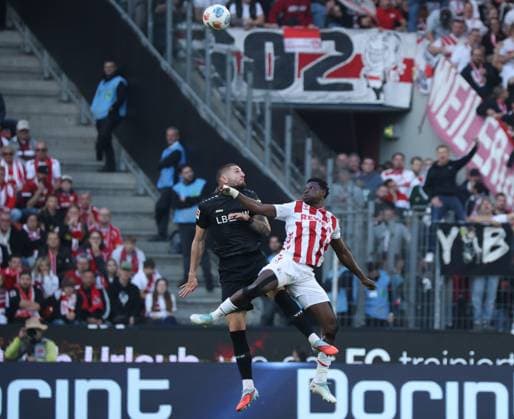 v l Jeff Chabot VfB Stuttgart 24 , Ragnar Ache 1 FC Koeln 09 GER, 1 FC Koeln vs VfB Stuttgart, Football, Bundesliga, Matchday 5, Season 2025 2026, 28 09 2025 DFL DFB REGULATIONS PROHIBIT ANY USE OF PHOTOGRAPHS as IMAGE SEQUENCES and or QUASI VIDEO GER, 1 FC Koeln vs VfB Stuttgart, Football, Bundesliga, Matchday 5, Season 2025 2026, 28 09 2025 Koeln Copyright: xEibner-Pressefotox xThomasxStoeckerx EP_TSR