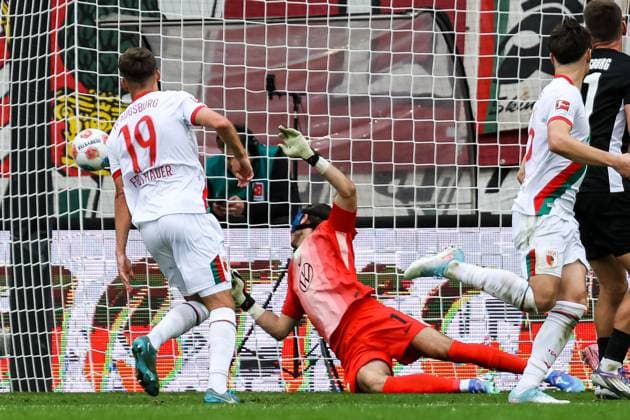 Goal for Augsburg 3 0 by Robin Fellhauer FC Augsburg 19 Kamil Grabara VFL Wolfsburg, 01 has no chance GER, FC Augsburg vs VfL Wolfsburg, 1 Bundesliga Soccer, 06 Matchday, Season 2025 2026, 04 10 2025 DFB DFL REGULATIONS PROHIBIT ANY USE OF PHOTOGRAPHS AS IMAGE SEQUENCES AND OR QUASI VIDEo GER, FC Augsburg vs VfL Wolfsburg, 1 Bundesliga Soccer, 06 Matchday, Season 2025 2026, 04 10 2025 Augsburg Copyright: xEibner-Pressefoto RogerxBuerkex EP_RBE
