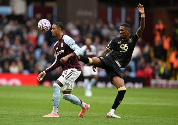 Ezri Konsa of Aston Villa and Jaidon Anthony of Burnley Aston Villa v Burnley, Premier League, Football, Villa Park, Birmingham, UK - 05 Oct 2025Birmingham Villa Park United Kingdom EDITORIAL USE ONLY No use with unauthorised audio, video, data, fixture lists, club league logos or live services. Online in-match use limited to 120 images, no video emulation. No use in betting, games or single club league player publications. Copyright: xAnnaxGowthorpe Shutterstockx 15515860w