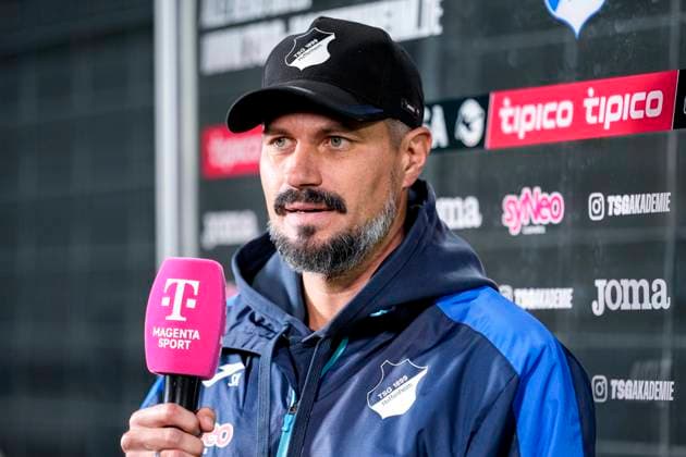 Stefan Kleineheismann coach, head coach, TSG II , with microphone during interview, TV, television, single picture, single photo, action, action, 05 10 2025, Sinsheim Germany , Soccer, 3 Liga, TSG 1899 Hoffenheim II VfB Stuttgart II, DFB DFL REGULATIONS PROHIBIT ANY USE OF PHOTOGRAPHS AS IMAGE SEQUENCES AND OR QUASI VIDEO xozx