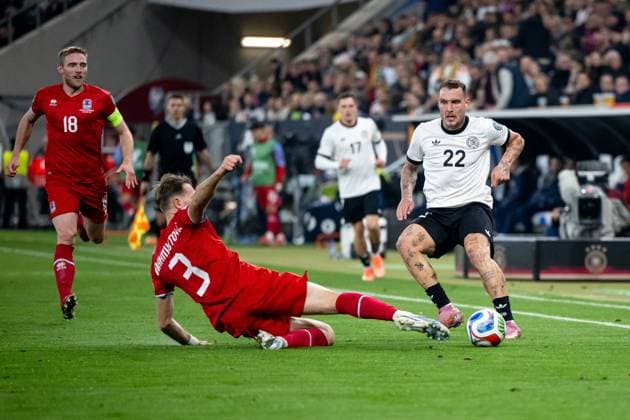 David Raum Germany, 22 in duel with Enes Mahmutovic Luxembourg, 03 , GER, Germany vs Luxembourg, Soccer, Men, World Cup Qualification Europe, Matchday 7, Season 2025 2026, 10 10 2025 GER, Germany vs Luxembourg, Soccer, Men, World Cup Qualification Europe, Matchday 7, Season 2025 2026, 10 10 2025 Sinsheim Copyright: xEibner-Pressefoto Memmlerx EP_MMR