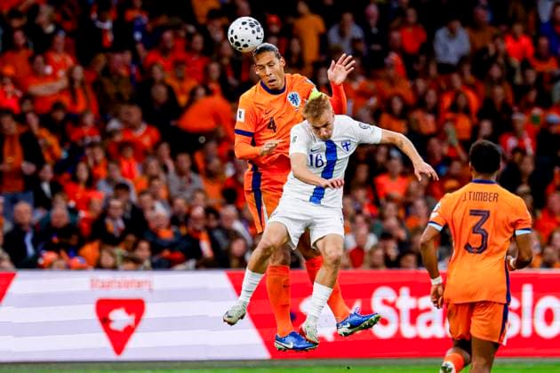 Virgil van Dijk of the Netherlands compete for the headed ball with Topi Keskinen of Finland Netherlands v Finland, FIFA World Cup, WM, Weltmeisterschaft, Fussball 2026 Qualifier, Netherlands v Finland, Johan Cruijff Arena, October 12, 2025, Amsterdam, Netherlands.