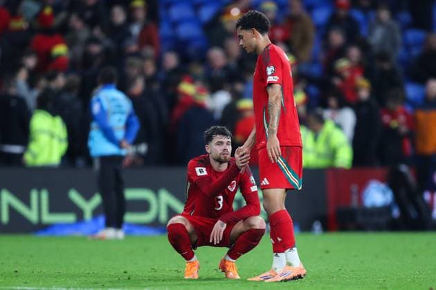 Cardiff, Wales, 13th October 2025. Neco Williams of Wales reacts to his team s loss after the Wales vs Belgium FIFA World Cup, WM, Weltmeisterschaft, Fussball European Qualifying match at the Cardiff City Stadium, Cardiff. Picture credit should read: Gareth Evans Sportimage EDITORIAL USE ONLY. No use with unauthorised audio, video, data, fixture lists, club league logos or live services. Online in-match use limited to 120 images, no video emulation. No use in betting, games or single club league player publications. SPI_057_GE_WAL_vs_BEL SPI-4214-0055