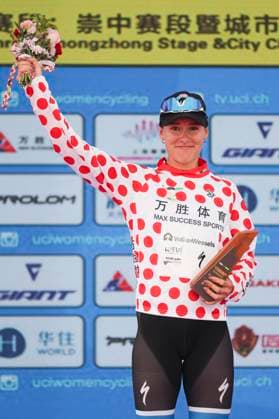 (251016) -- SHANGHAI, Oct. 16, 2025 -- Anne Knijnenburg of Volkerwessels Cycling Team, in the polka-dot jersey, is seen during the awarding ceremony after the Stage 3 of the UCI Women s WorldTour Tour of Chongming Island Road cycling, Rad, Radsport, Strasse race in Shanghai, east China, Oct. 16, 2025. ) (SP)CHINA-SHANGHAI-CYCLING-UCI WOMEN S WORLDTOUR-TOUR OF CHONGMING ISLAND (CN) WangxXiang