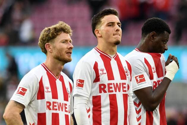 Florian Kainz (1. FC Koeln), Said El Mala (1. FC Koeln) und Ragnar Ache (1. FC Koeln) schauen waehrend des Spiels der Bundesliga zwischen 1. FC Köln und FC Augsburg, RheinEnergieSTADION am 18. October 2025 in Köln, Deutschland. (Foto von Ralf Treese DeFodi Images) +++ Florian Kainz (1. FC Koeln), Said El Mala (1. FC Koeln) und Ragnar Ache (1. FC Koeln) looks on during the Bundesliga match between 1. FC Köln and FC Augsburg at RheinEnergieSTADION on October 18, 2025 in Köln, Germany. (Photo by Ralf Treese DeFodi Images) DFL regulations prohibit any use of photographs as image sequences and or quasi-video. (Photo by Ralf Treese DeFodi Images) Florian Kainz 1 FC Koeln , Said El Mala 1 FC Koeln and Ragnar Ache 1 FC Koeln looks on during the Bundesliga match between 1 FC Köln and FC Augsburg at RheinEnergieSTADION on October 18, 2025 in Cologne, Germany Photo by Ralf Treese DeFodi Images Florian Kainz 1 FC Koeln , Said El Mala 1 FC Koeln and Ragnar Ache 1 FC Koeln looks on during the Bundesliga match between 1 FC Köln and FC Augsburg at RheinEnergieSTADION on October 18, 2025 in Köln, Germany Photo by Ralf Treese DeFodi Images DFL regulations prohibit any use of photographs as image sequences and or quasi video Photo by Ralf Treese DeFodi Images