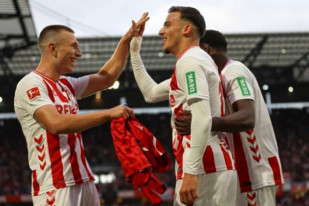 Said El Mala (1. FC Koeln) Torjubel,jubelt mit seiner Mannschaft nach dem Treffer zum 1:1 waehrend des spiels der Bundesliga zwischen 1. FC Köln und FC Augsburg, RheinEnergieSTADION am 18. October 2025 in Köln, Deutschland. (Foto von Oliver Kaelke DeFodi Images) +++ Said El Mala (1. FC Koeln) celebrates after scoring his team s first goal with teammates during the Bundesliga match between 1. FC Köln and FC Augsburg at RheinEnergieSTADION on October 18, 2025 in Köln, Germany. (Photo by Oliver Kaelke DeFodi Images) DFL regulations prohibit any use of photographs as image sequences and or quasi-video. (Photo by Oliver Kaelke DeFodi Images) Said El Mala 1 FC Koeln Torjubel,jubilates with his team after scoring the 1 1 goal during the Bundesliga match between 1 FC Köln and FC Augsburg, RheinEnergieSTADION on October 18, 2025 in Köln, Germany Photo by Oliver Kaelke DeFodi Images Said El Mala 1 FC Koeln celebrates after scoring his team s first goal with teammates during the Bundesliga match between 1 FC Köln and FC Augsburg at RheinEnergieSTADION on October 18, 2025 in Köln, Germany Photo by Oliver Kaelke DeFodi Images DFL regulations prohibit any use of photographs as image sequences and or quasi video Photo by Oliver Kaelke DeFodi Images