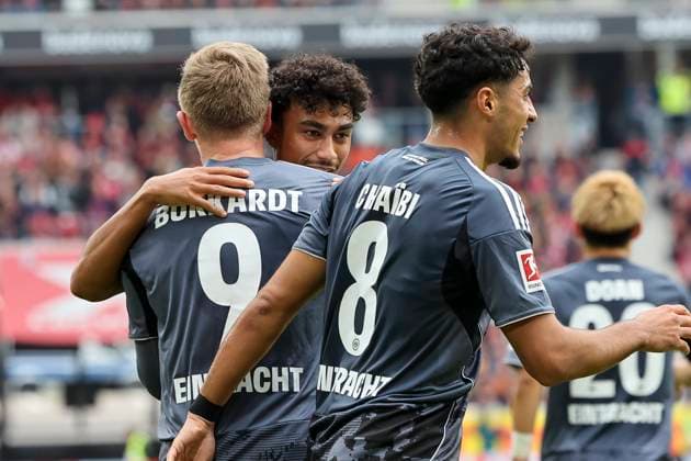 Goal celebration Eintracht Frankfurt at 1 2 by Jonathan Burkardt Eintracht Frankfurt, 09 with Fares Chaibi Eintracht Frankfurt, 08 and Nathaniel Brown Eintracht Frankfurt, 21 , Germany, Soccer, 1 Bundesliga, Matchday 7, 2025 2026, SC Freiburg vs Eintracht Frankfurt, 19 10 2025, Europa Park Stadion, Freiburg im Breisgau, Germany Freiburg im Breisgau Europa Park Stadion Baden Württemberg Germany Copyright: xGrantxHubbsx