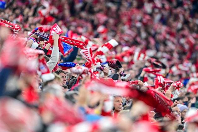 FC Bayern fans waving their scarves after the goal, fans, audience, spectators, mood, atmosphere, stadium, 22 10 2025, Munich Germany , football, UEFA Champions League, league phase, FC Bayern Munich Club Bruges, THE EVENT REGULATES PROHIBIT ANY USE OF PHOTOGRAPHS AS IMAGE SEQUENCES AND OR QUASI VIDEOS xslx