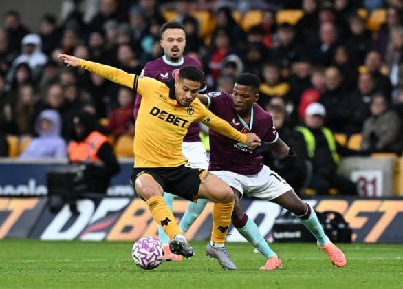 Joao Gomes of Wolverhampton Wanderers and Florentino Luis of Burnley Wolverhampton Wanderers v Burnley, Premier League, Football, Molineux, Wolverhampton, UK - 26 Oct 2025Wolverhampton Molineux United Kingdom EDITORIAL USE ONLY No use with unauthorised audio, video, data, fixture lists, club league logos or live services. Online in-match use limited to 120 images, no video emulation. No use in betting, games or single club league player publications. Copyright: xAnnaxGowthorpe Shutterstockx 15593503an