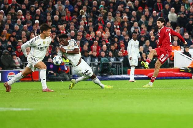 Aurà lien Tchouamà ni of Real Madrid handles a shot from Dominik Szoboszlai of Liverpool Liverpool v Real Madrid, UEFA Champions League, Group Stage, Football, Anfield, Liverpool, UK - 04 Nov 2025Liverpool Anfield United Kingdom EDITORIAL USE ONLY No use with unauthorised audio, video, data, fixture lists, club league logos or live services. Online in-match use limited to 120 images, no video emulation. No use in betting, games or single club league player publications. Copyright: xPaulxCurrie Shutterstockx 15642053bk