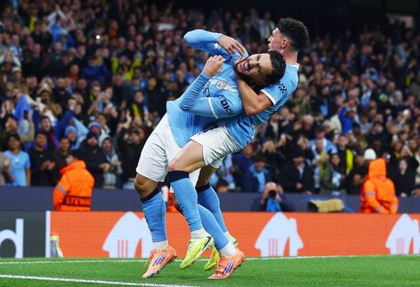 Rayan Cherki of Manchester City celebrates scoring a goal to make it 4-1 with Phil Foden Manchester City v Borussia Dortmund, UEFA Champions League, Group Stage, Football, Etihad Stadium, Manchester, UK - 05 Nov 2025Manchester Etihad Stadium United Kingdom EDITORIAL USE ONLY No use with unauthorised audio, video, data, fixture lists, club league logos or live services. Online in-match use limited to 120 images, no video emulation. No use in betting, games or single club league player publications. Copyright: xMattxWest Shutterstockx 15642186ah