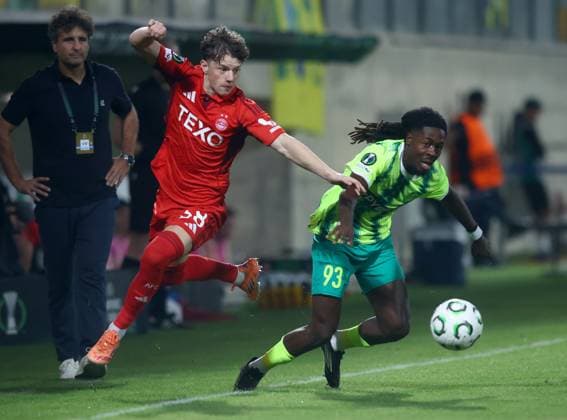 Dylan Lobban of Aberdeen (left) in action against Jeremie Gnali of AEK Larnaca AEK Larnaca v Aberdeen, UEFA Conference League, Group Stage, Football, AEK Arena, Larnaca, Cyprus - 06 Nov 2025Larnaca AEK Arena Cyprus EDITORIAL USE ONLY No use with unauthorised audio, video, data, fixture lists, club league logos or live services. Online in-match use limited to 120 images, no video emulation. No use in betting, games or single club league player publications. Copyright: xCharaxSavvides Shutterstockx 15642241ao