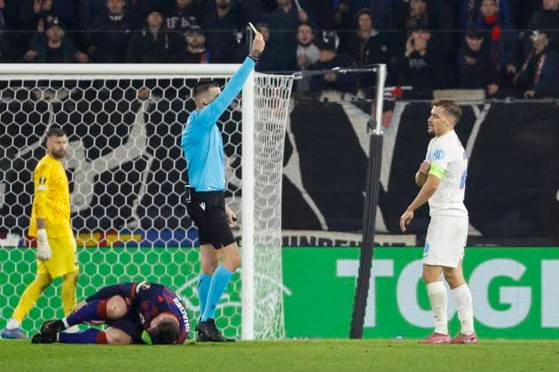 Darius Olaru FCSB Bucharest, 27 gets yellow card from referee Juxhin Xhaja ALB , Switzerland, Football, UEFA Europa League, Matchday 4, 2025 2026, FC Basel vs FCSB Bucharest, 06 11 2025, Sankt Jakob Park, Basel, Switzerland Basel Sankt Jakob Park Canton Basel City Switzerland Copyright: xGrantxHubbsx