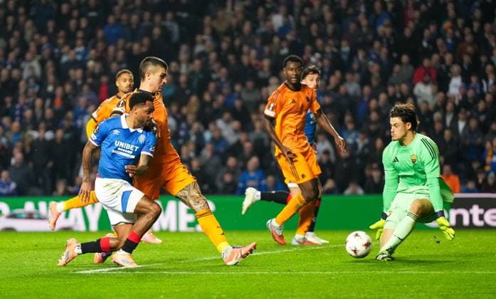 Danilo of Rangers shot at goal saved by AS Roma goalkeeper Mile Svilar. Rangers v Roma, UEFA Europa League, Group Stage, Football, Ibrox Stadium, Glasgow, Scotland, UK - 06 Nov 2025Glasgow Ibrox Scotland United Kingdom EDITORIAL USE ONLY No use with unauthorised audio, video, data, fixture lists, club league logos or live services. Online in-match use limited to 120 images, no video emulation. No use in betting, games or single club league player publications. Copyright: xStuartxWallace Shutterstockx 15642261as