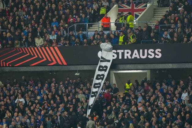 Rangers fans pull protest banners away from security stewards as the stewards try to remove them from the Sandy Jardine Stand. Rangers v Roma, UEFA Europa League, Group Stage, Football, Ibrox Stadium, Glasgow, Scotland, UK - 06 Nov 2025Glasgow Ibrox Scotland United Kingdom EDITORIAL USE ONLY No use with unauthorised audio, video, data, fixture lists, club league logos or live services. Online in-match use limited to 120 images, no video emulation. No use in betting, games or single club league player publications. Copyright: xStuartxWallace Shutterstockx 15642261bx