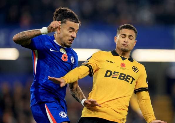Malo Gusto of Chelsea in action against Joao Gomes of Wolverhampton Wanderers Chelsea v Wolverhampton Wanderers, Premier League, Football, Stamford Bridge, London, UK - 08 Nov 2025London Stamford Bridge United Kingdom EDITORIAL USE ONLY No use with unauthorised audio, video, data, fixture lists, club league logos or live services. Online in-match use limited to 120 images, no video emulation. No use in betting, games or single club league player publications. Copyright: xGeorgexTewkesbury Shutterstockx 15702174aa