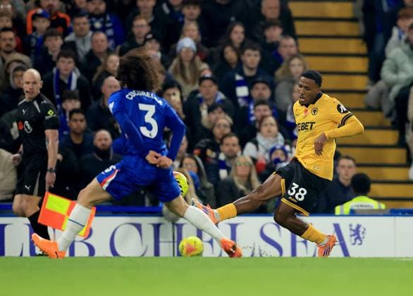 Jackson Tchatchoua of Wolverhampton Wanderers in action against Marc Cucurella of Chelsea Chelsea v Wolverhampton Wanderers, Premier League, Football, Stamford Bridge, London, UK - 08 Nov 2025London Stamford Bridge United Kingdom EDITORIAL USE ONLY No use with unauthorised audio, video, data, fixture lists, club league logos or live services. Online in-match use limited to 120 images, no video emulation. No use in betting, games or single club league player publications. Copyright: xGeorgexTewkesbury Shutterstockx 15702174ab